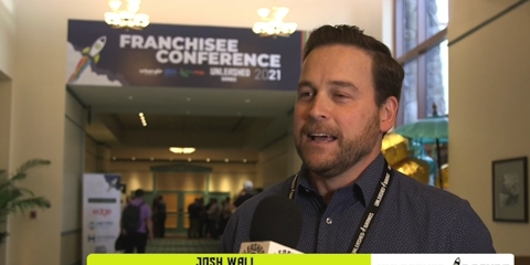 josh wall of unleashed brands speaking at the franchisee conference