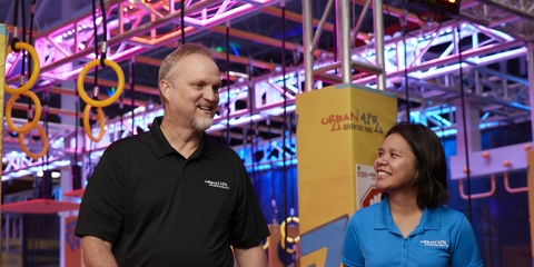 business owner speaking with employee