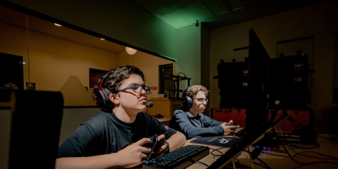 two young boys competing in esports