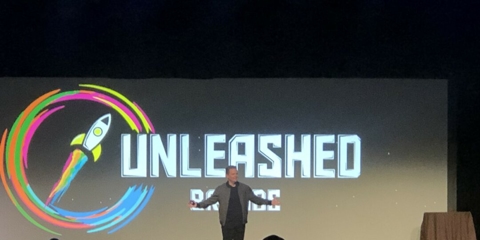 Unleashed Brands' CEO MIchael Browning giving keynote message at the conference